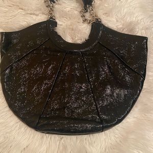 NWOT. HOBO International black patent leather bag.